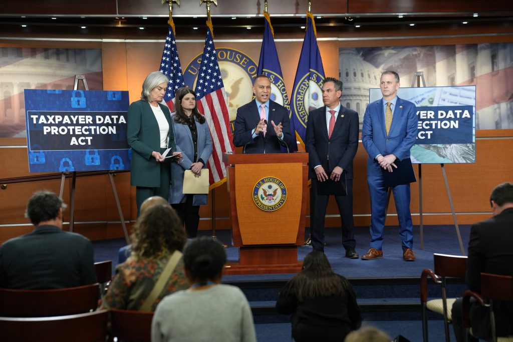 Leader Jeffries (center) speaking at press conference, joined by (left to right) Democratic Whip Katherine Clark, Rep. Haley Stevens, Democratic Caucus Chair Pete Aguilar, Rep. Sean Casten