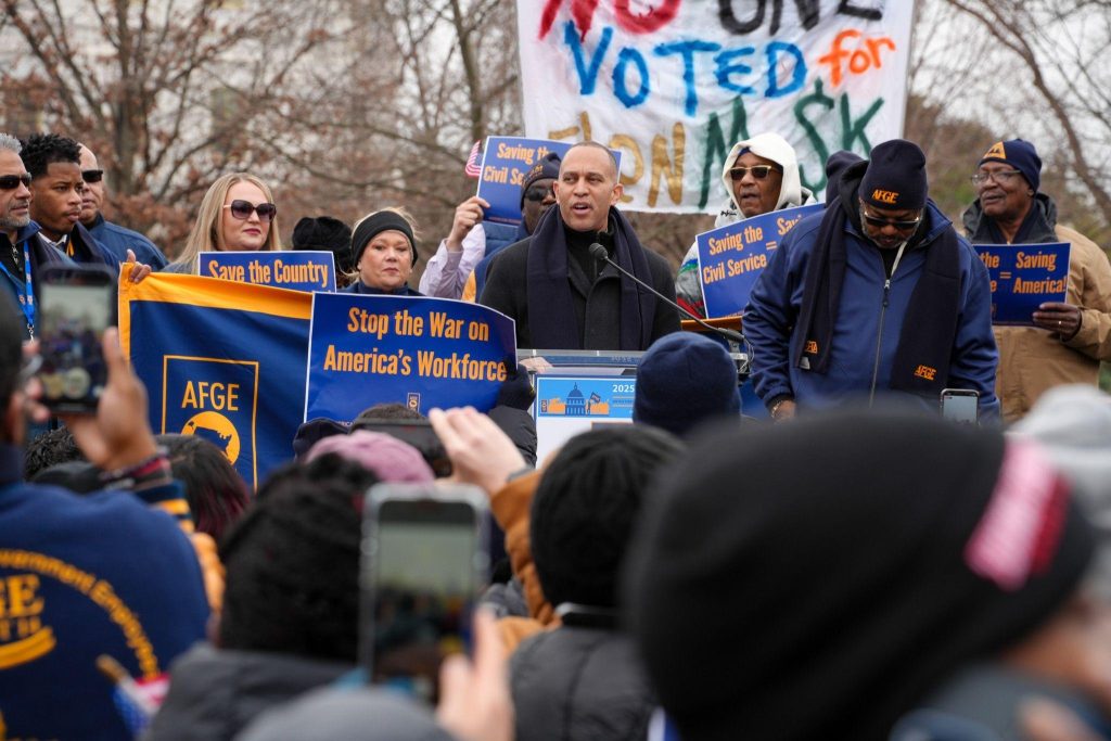 Leader Jeffries (center) speaking at a rally with members of the American Federation of Government Employees