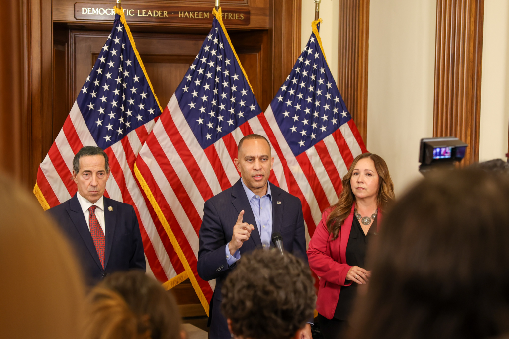 Rep. Jamie Raskin (left), Leader Jeffries (center), Rep.-Elect Adelita Grijalva (right) speaking at press conference
