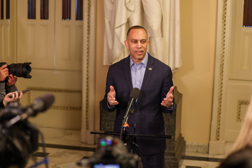 Leader Jeffries Speaking at Press Conference near Will Rogers statue
