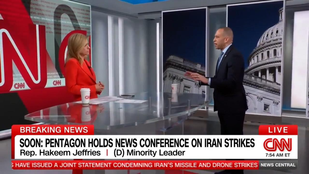 Kate Bolduan (left) and Leader Jeffries (right) standing at a glass table on CNN's CNN News Central