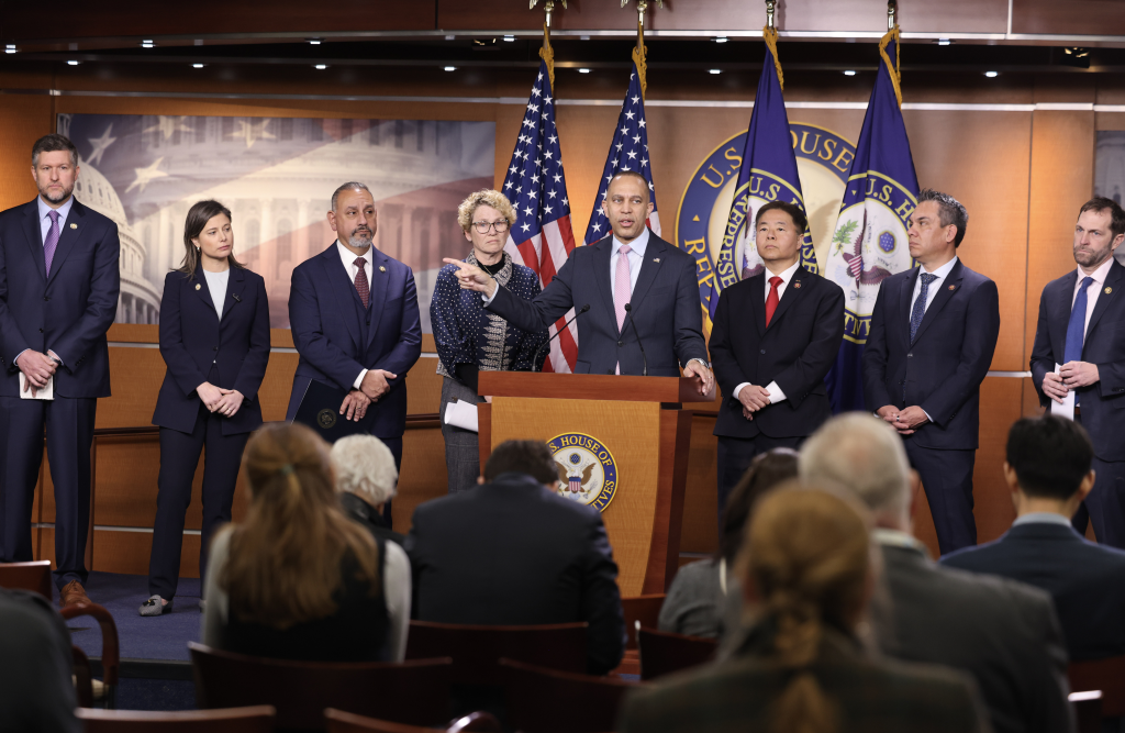 Leader Jeffries speaking at press conference with (from left to right) Rep. Pat Ryan, Rep. Maggie Goodlander, Rep. Gil Cisneros, Rep. Chrissy Houlahan, Vice Chair Ted Lieu, Chair Pete Aguilar, Rep. Jason Crow
