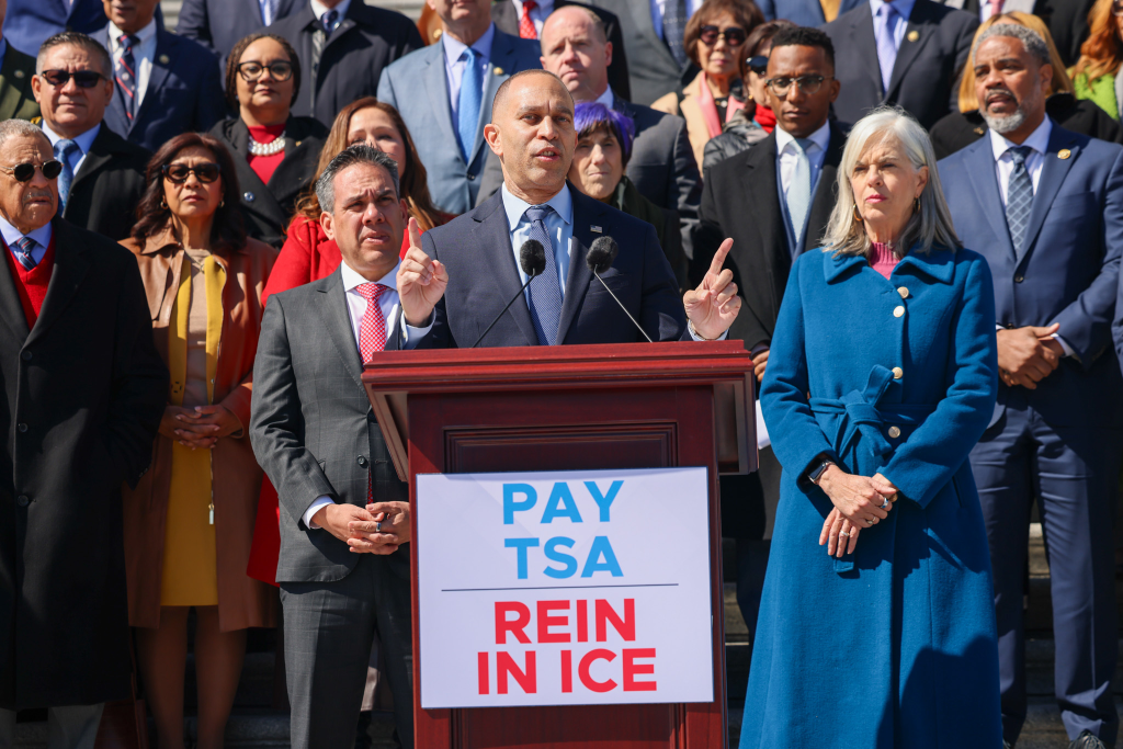 Leader Jeffries (center) speaking on the House steps between Chair Pete Aguilar (left) and Whip Katherine Clark (right)