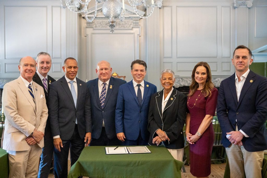 Leader Jeffries (center) and Members of the America250 Commission